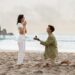 romantic proposal seashore loving young man with engagement ring making proposal happy